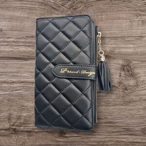 Elegant Black Quilted Wallet with Tassel by [Brand]